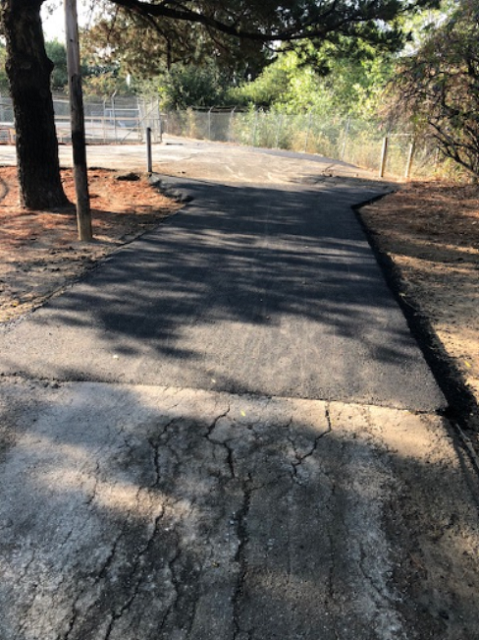 Beelard Park path showing section of repaved asphalt