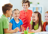 little kids smiling and playing together