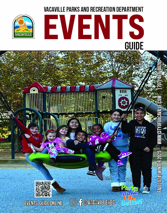 Front cover of the fall/winter events guide showing kids playing on a new inclusive swing