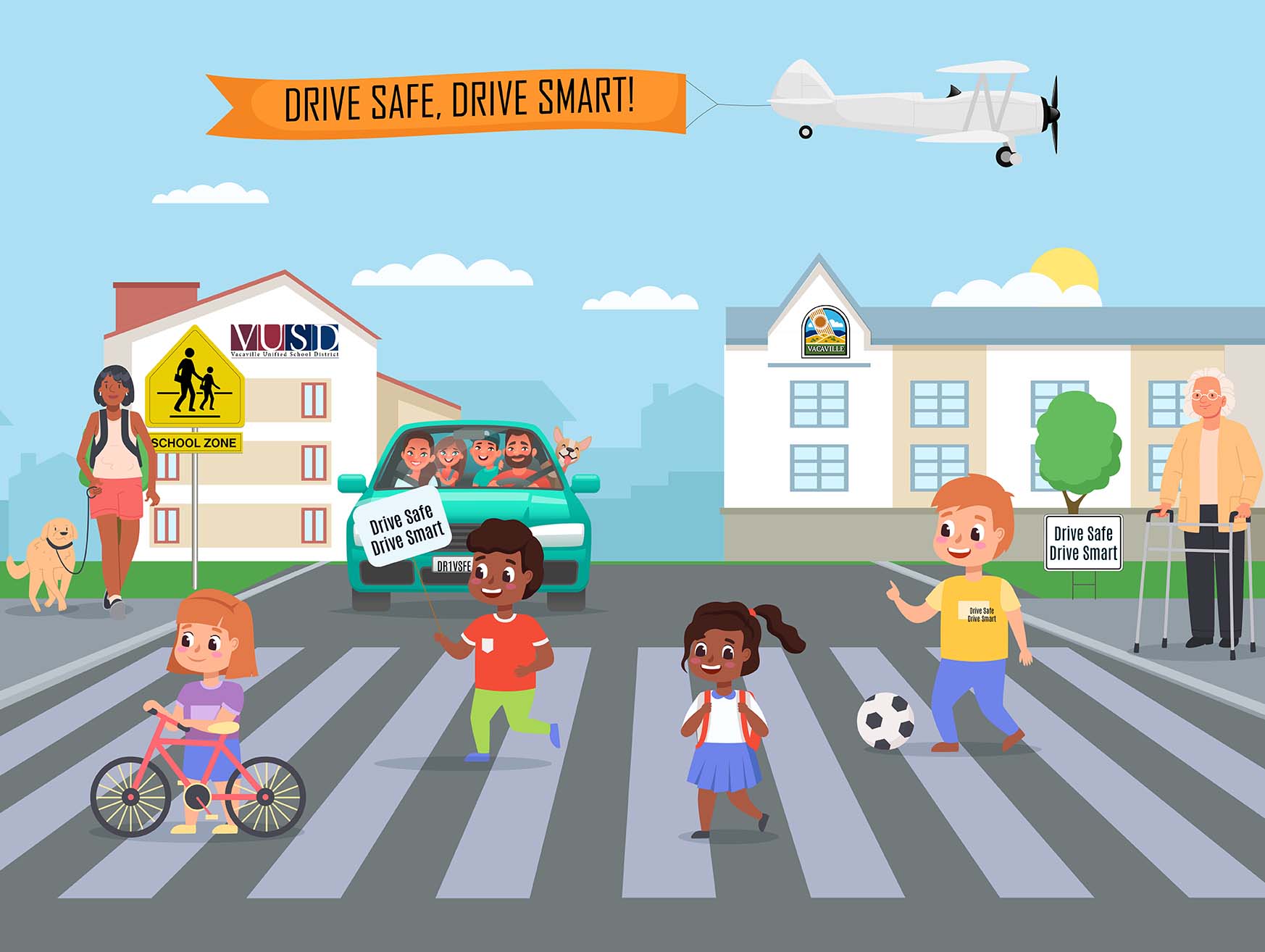 Drive Safe Drive Smart Crosswalk with children and adults walking across.  Vehicle stopped.  "Drive Safe Drive Smart on banners, t-shirt, license plate, and a plane pulling a banneri n the sky.  Buildings in the background with City and Vacaville Unified School District logos.