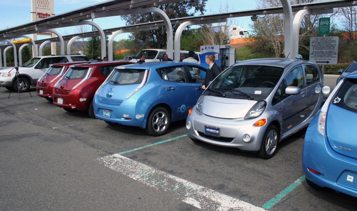 Vehicles line up for a charge at the new quick charge station